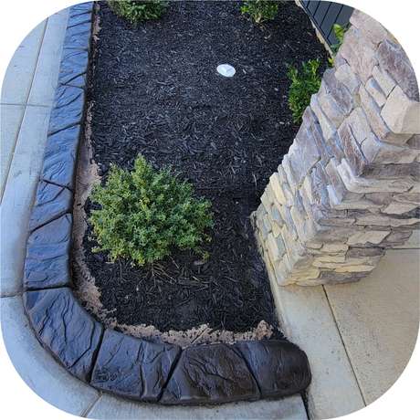 Mountain Stone stamped concrete curb pattern installed by Killer Curbz