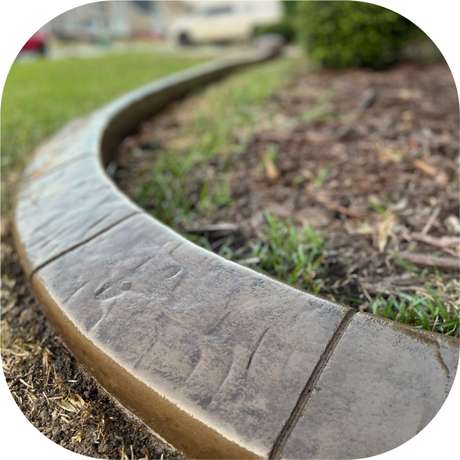Slate stamped concrete curb pattern installed by Killer Curbz